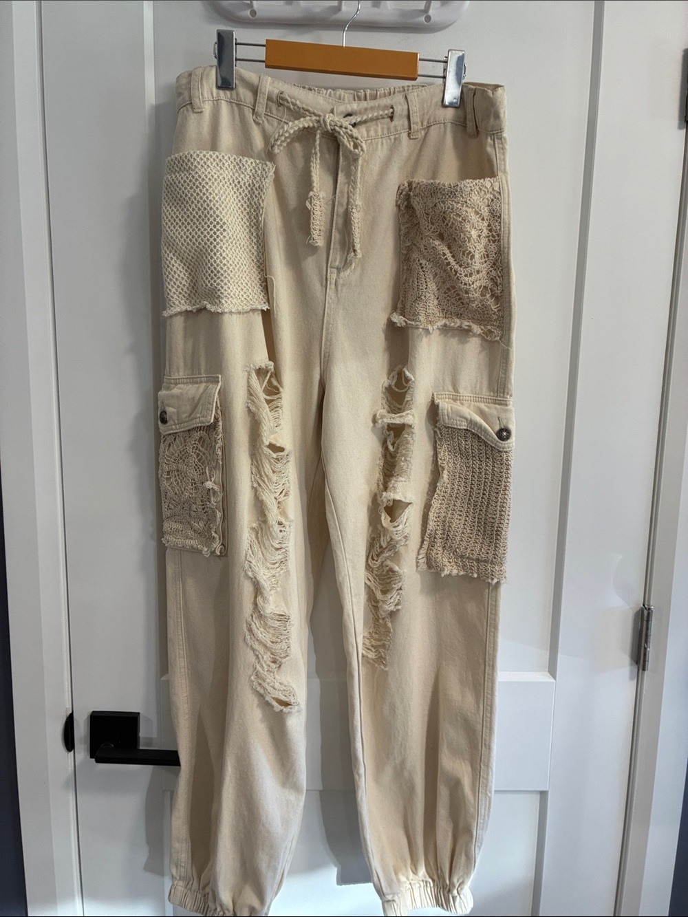 POL highly distressed joggers with zip and button